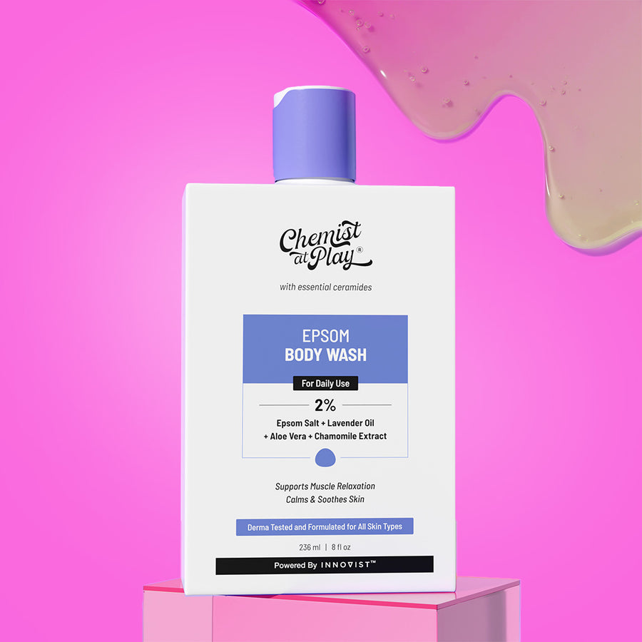 Epsom body wash bottle with a pink background