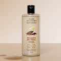 Bare Anatomy Flaxseed & Rice Water Hair Gel bottle on a beige background